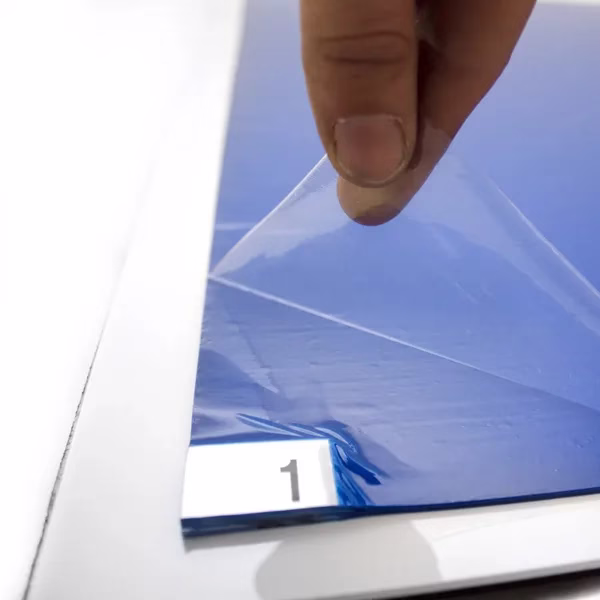 peeling layer from sticky tack mat