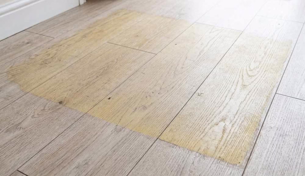 LVT Vinyl Floor Discolouration beneath rubber backed mat
