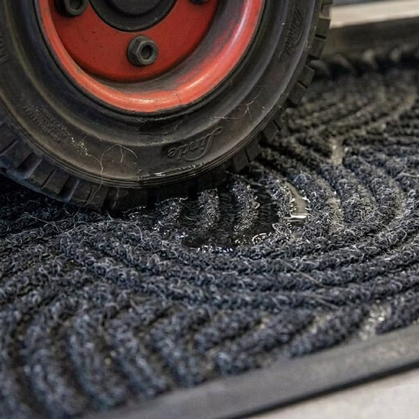 WPF-Waterhog-Plus-Forklift-Mats-Close-Up-Solution-Main Waterhog Plus Forklift Mat Wheel and Sanitiser Solution Close Up