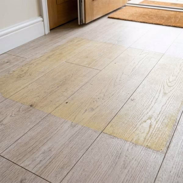 LVT Vinyl Floor Discolouration beneath rubber backed mat