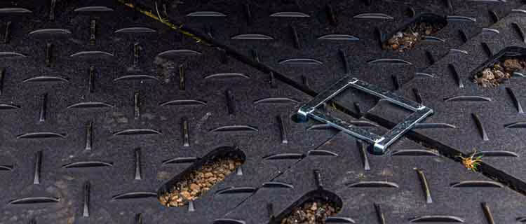 GroundShield Ground Protection Mat Connectors 24 GroundShield Ground Protection Mats Connectors 4 Way Galvanised Connector in use with car